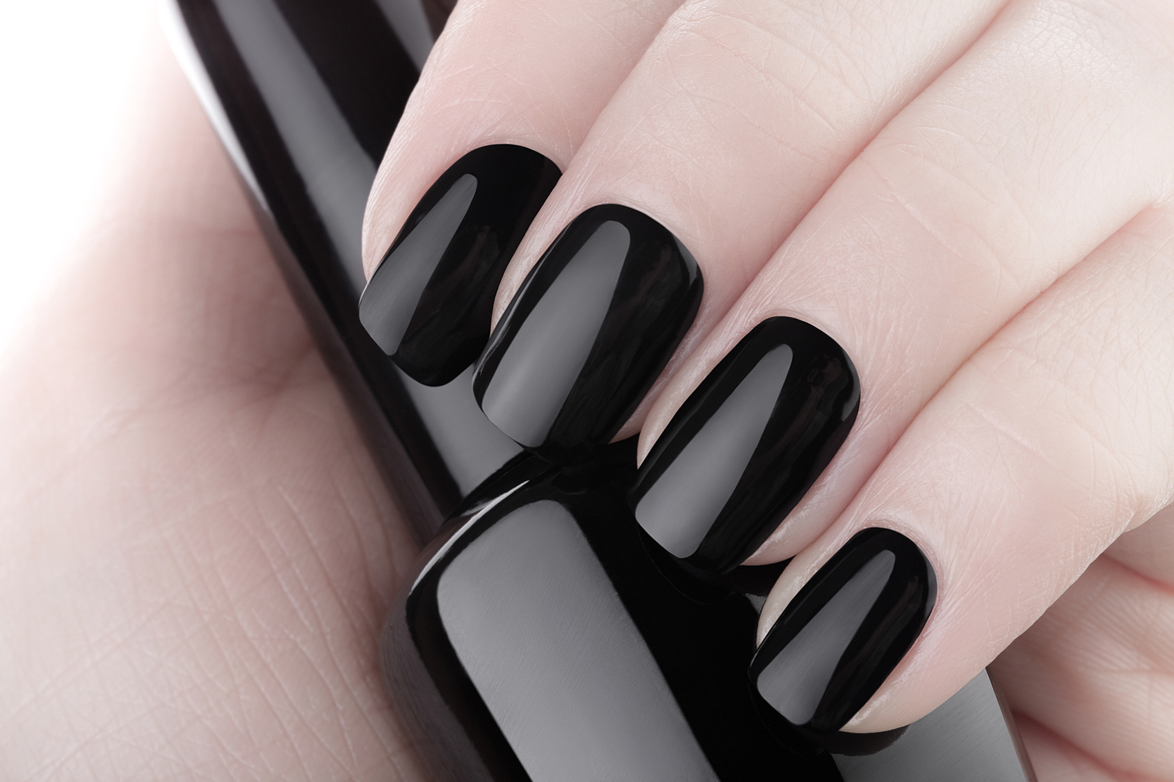 Very beautiful black nails close up.